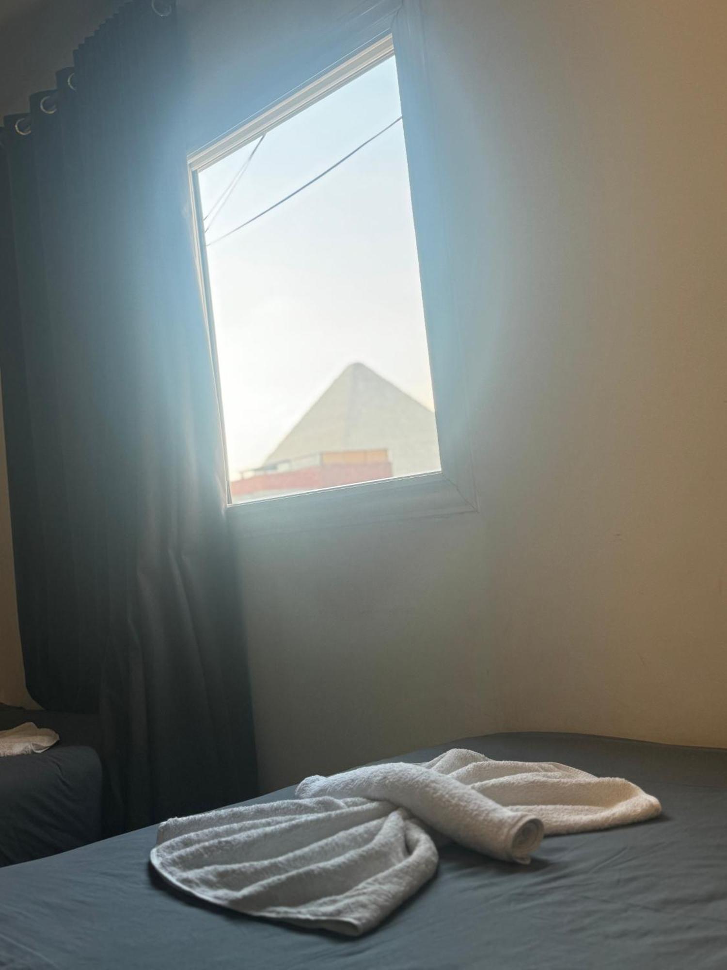Pyramids And Sphinx Hotel Kafret el-Gabal Esterno foto