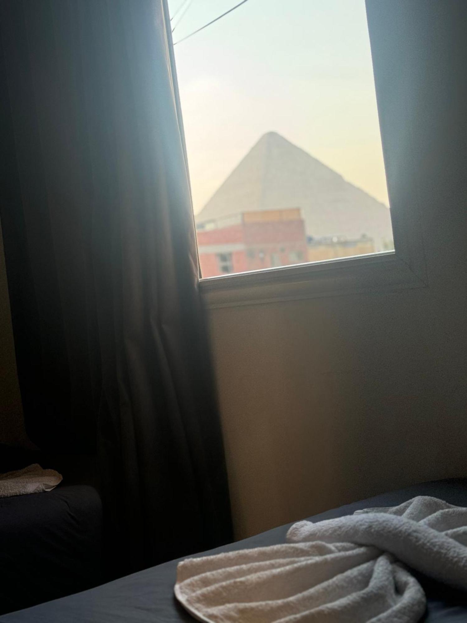 Pyramids And Sphinx Hotel Kafret el-Gabal Esterno foto