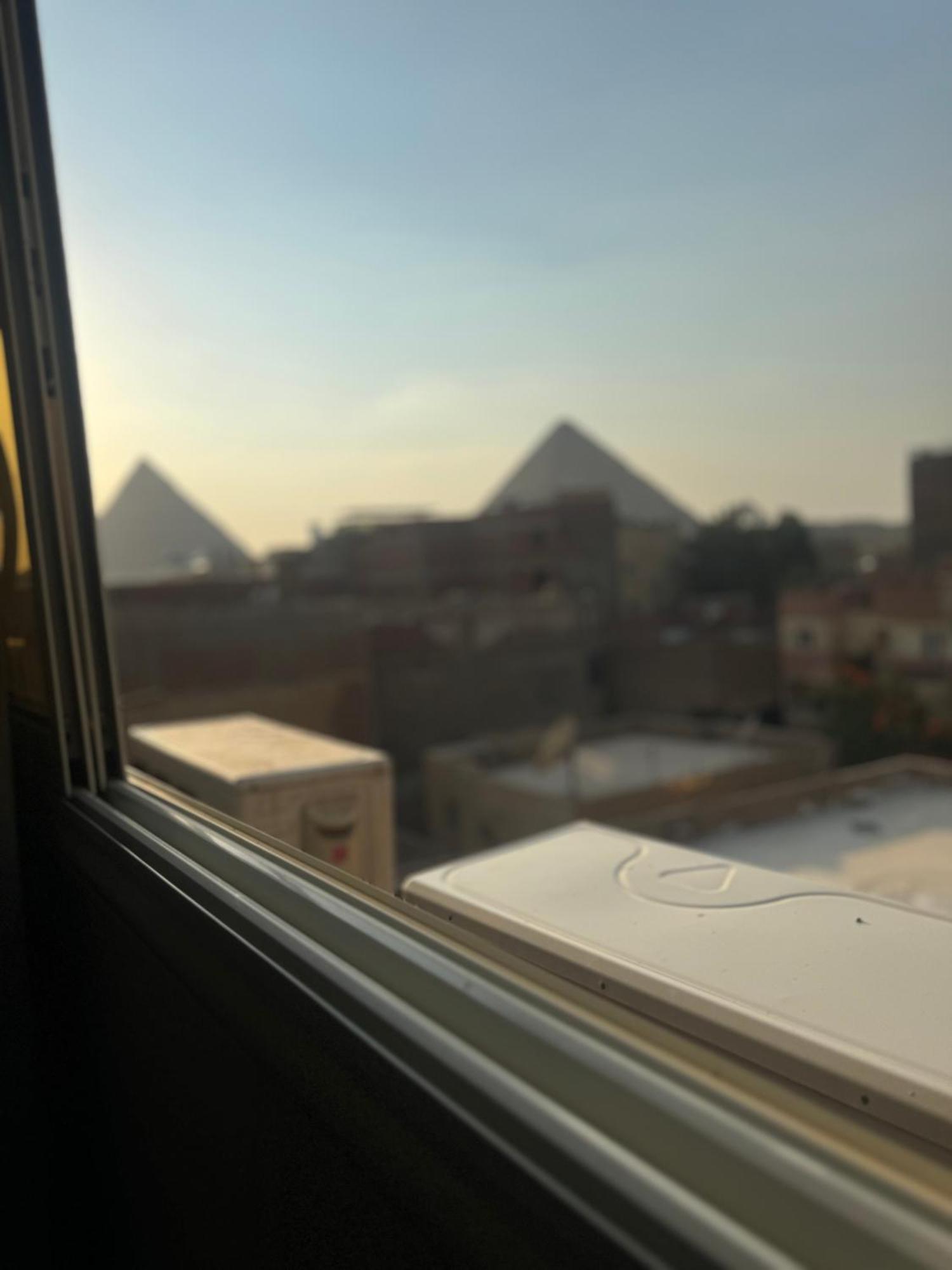 Pyramids And Sphinx Hotel Kafret el-Gabal Esterno foto